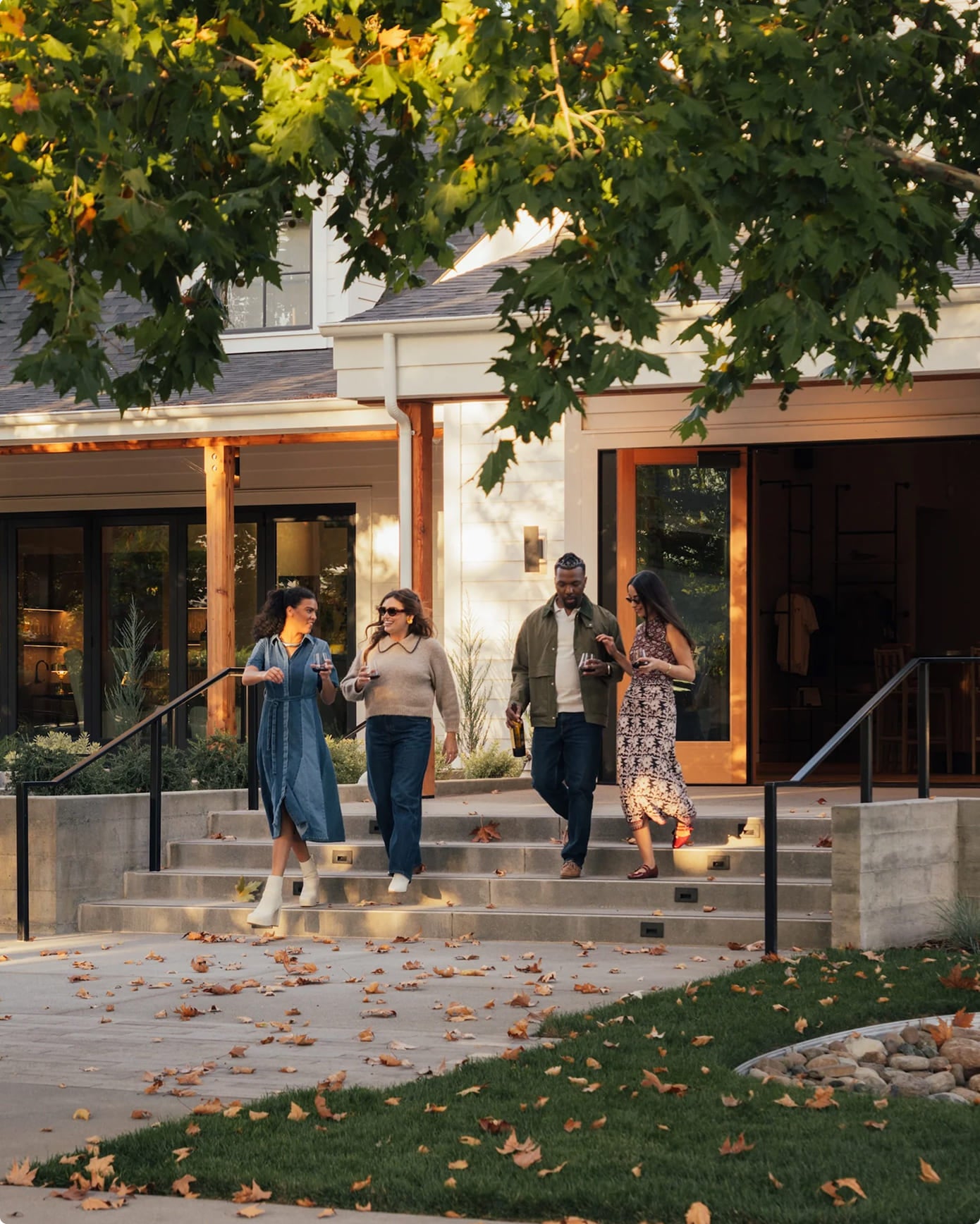 Guests walking toward a winery tasting room entrance