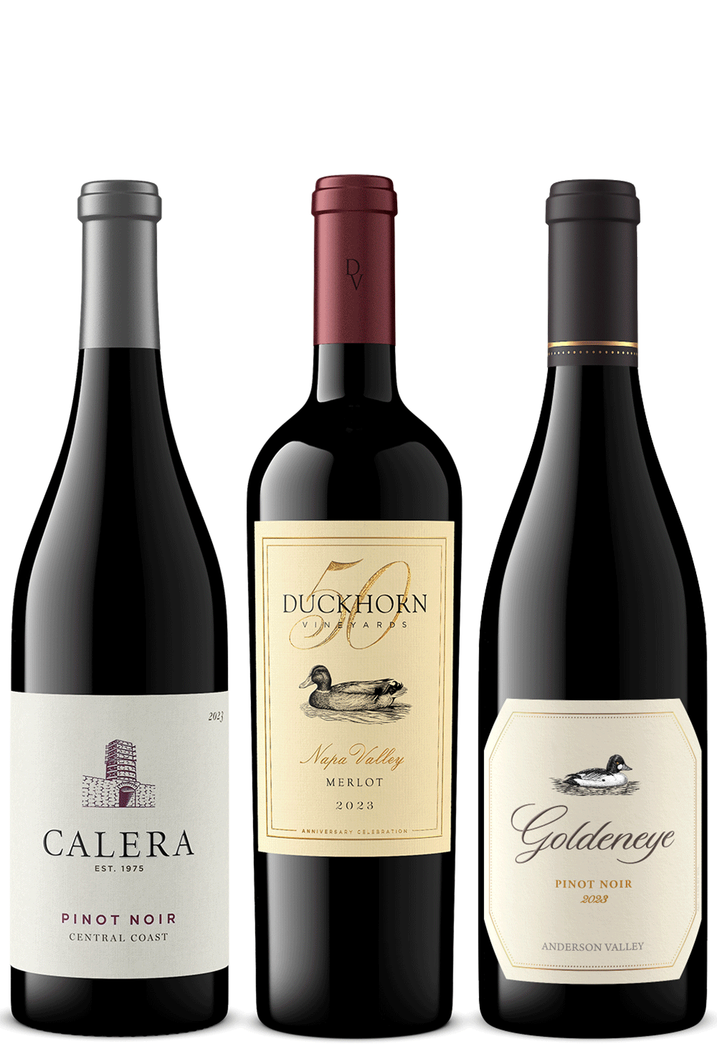 Three red wine bottles arranged side by side on a light gray background: Calera Central Coast Pinot Noir on the left, Duckhorn 50th Anniversary Merlot in the center, and Goldeneye Anderson Valley Pinot Noir on the right.